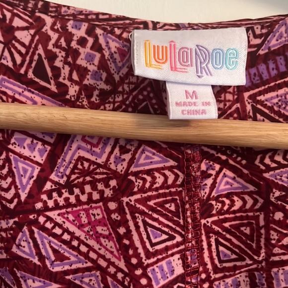 Medium LulaRoe geometry high low print. Never been worn! - Picture 3 of 4